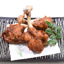 Deep-fried chicken wing drumettes