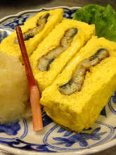 Wrapped omelet with eel