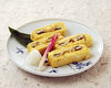 Wrapped omelet with eel