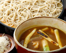 Buckwheat noodles served on a bamboo strainer