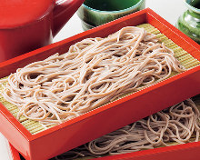 Buckwheat noodles served on a bamboo strainer