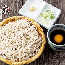 Buckwheat noodles served on a bamboo strainer