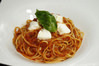 Pasta with tomato sauce, mozzarella, and basil