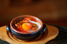 Simmered in tomato sauce