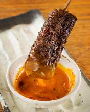 Meatballs served with egg yolk