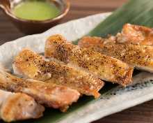 Grilled locally raised chicken thigh with rock salt