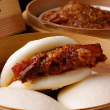 Simmered pork belly with steamed bun