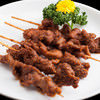 Grilled pork cheek skewers