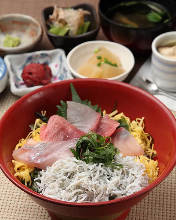 Seafood rice bowl topped with whitebait