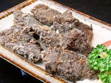 Marinated deep-fried whale (seasoned with soy sauce)