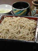 Buckwheat noodles served on a bamboo strainer