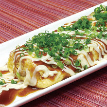 Tonpei-yaki (stir-fried cabbage and meat topped with egg) Tonpei-yaki (stir-fried cabbage and meat topped with egg)