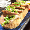 Thickly-sliced beef tongue baked in salt