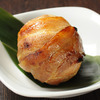 Rice ball wrapped with pork flavored with soy sauce