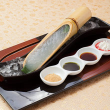 Warabimochi (bracken-starch dumpling covered in sweet, toasted soybean flour)