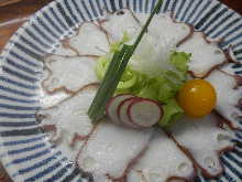 Thinly sliced octopus sashimi
