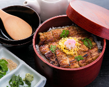 Eel served over rice in a lacquered box