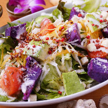 Caesar salad with purple sweet potato