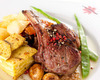 Roast Lamb with Bones with Rulo Cremoso de Cabra (goat cheese)