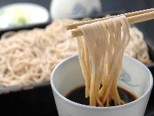 Buckwheat noodles served on a bamboo strainer