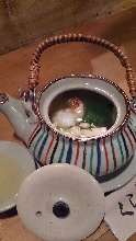 Matsutake steamed in an earthenware teapot
