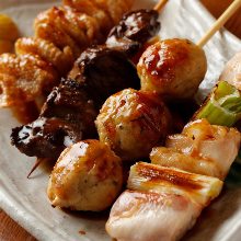 Assorted grilled chicken skewers