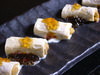Soy sauce gelee of sea urchin in a fresh yuba roll Soy sauce gelee of sea urchin in a fresh yuba roll