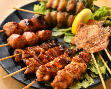 Assorted grilled chicken skewers