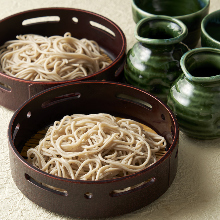 Buckwheat noodles served on a bamboo strainer