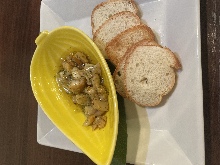 Whelk sauteed with garlic butter