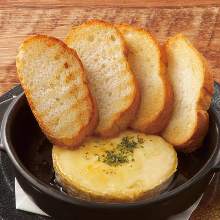 Grilled camembert cheese with honey topping