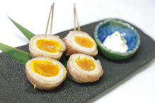 Prok wrapped seasoned boiled egg