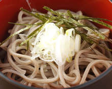 Buckwheat noodles served on a bamboo strainer