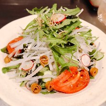 Daikon and baby sardines salad