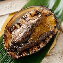 Grilled live abalone