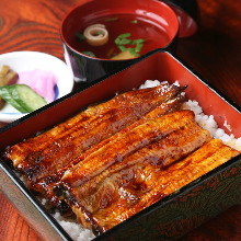 Extra premium eel served over rice in a lacquered box