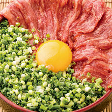 Marbled horse meat with raw egg rice bowl