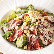 Caesar salad with smoked horse meat