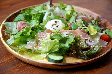 Slow-poached egg and raw ham salad