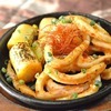 Squid and leek stir-fried with broad bean chili paste Squid and leek stir-fried with broad bean chili paste