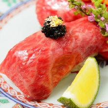 Meat sushi with caviar