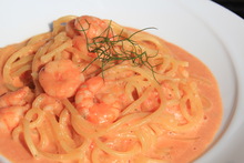 Small shrimp in tomato cream sauce
