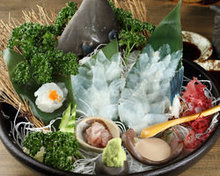 Sugata-zukuri (sliced sashimi served maintaining the look of the whole fish)