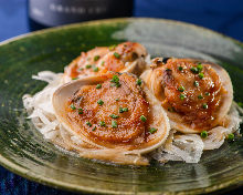Grilled common orient clams with butter