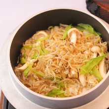 Steamed rice with toppings in wooden steamer