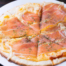 Prosciutto and codded egg pizza