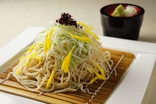 Buckwheat noodles served on a bamboo strainer