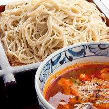 Buckwheat noodles served on a bamboo strainer