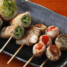 Assorted grilled vegetable roll skewers