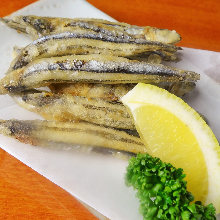 Fried silver-stripe round herring